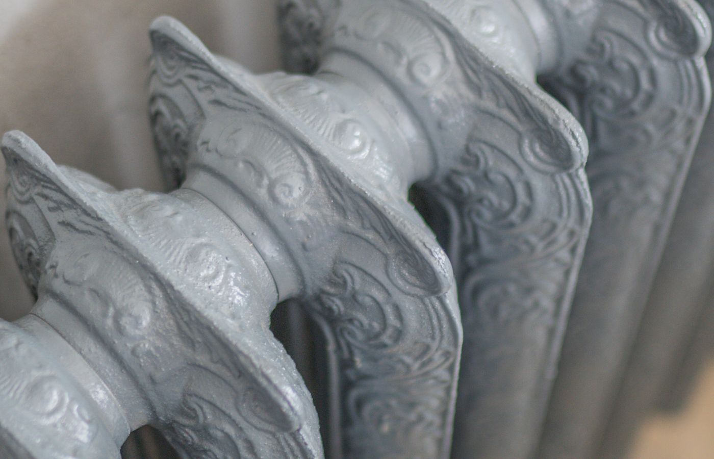 Close-up of a cast-iron non-electric radiator.